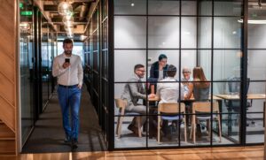 Leader stepping away while the team continues working independently together